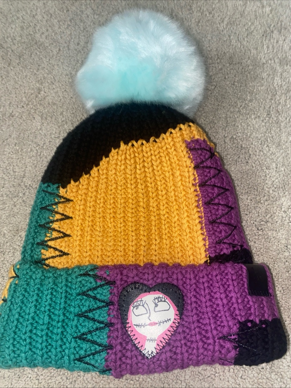 Love Your Melon Disney Sally Patchwork Multicolor Beanie Pom Pom Hat